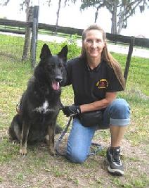 Dawn Hutchins, shown here with "Karma" a German Shepherd female, is another of our trainers.
